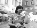 Throwing a Coin into the Trevi Fountain