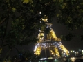 Street view of the Eiffel Tower at night