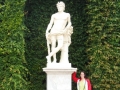 Me with one of the many statues on the grounds of the Palace of Versailles
