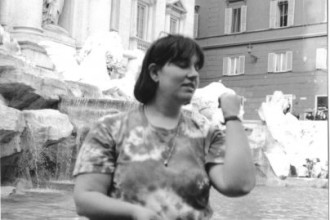 Throwing a Coin into the Trevi Fountain